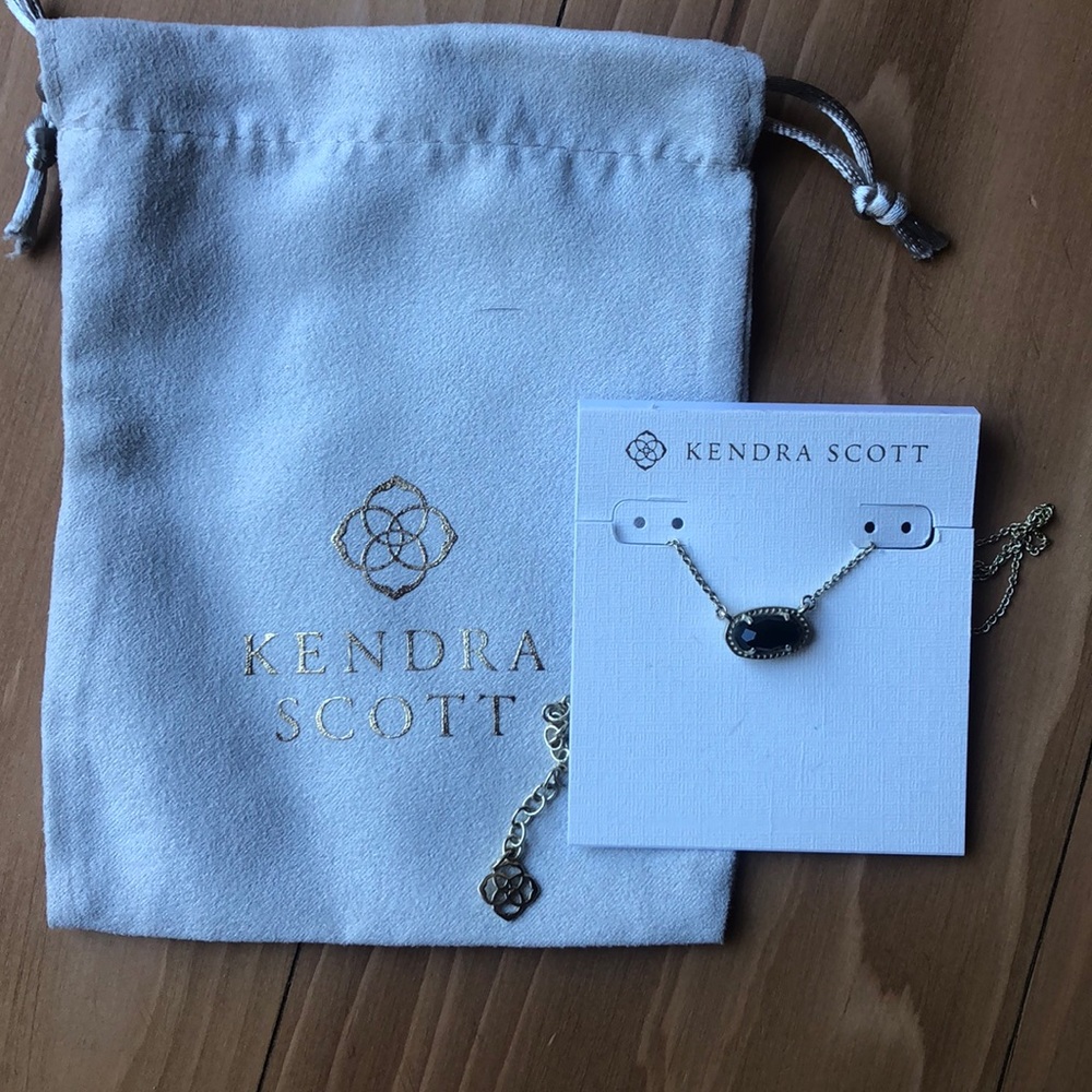 Black and gold Kendra Scott necklace worn 3x